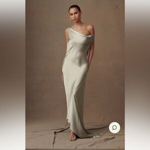 Asymmetrical satin slip dress in sage green. NWT. Never before worn.